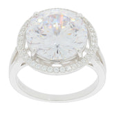 Elegant round white Moissanite ring with sparkling accents in a sterling silver setting, radiating luxury and brilliance.